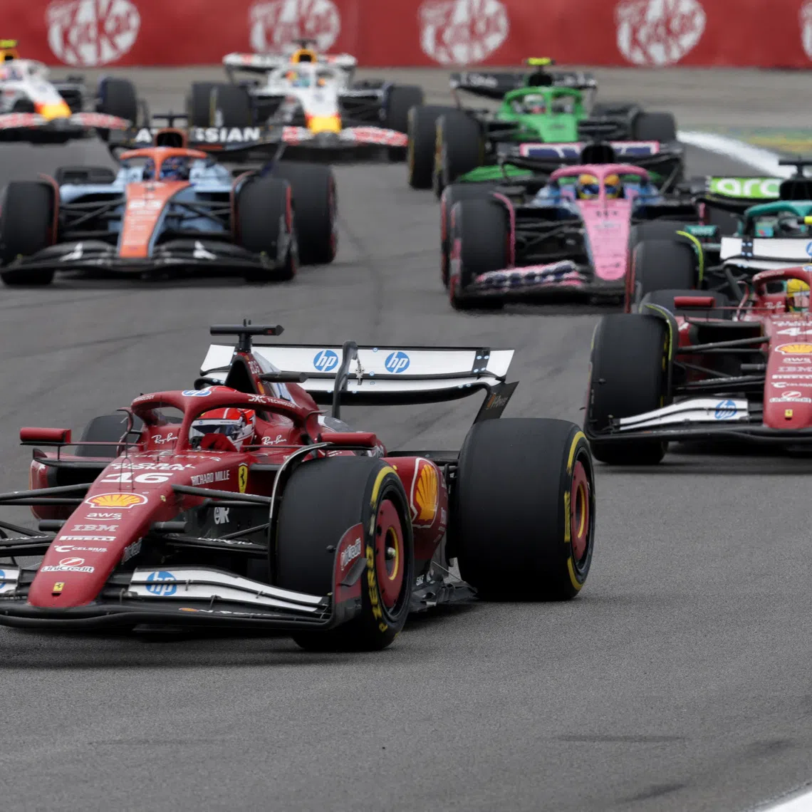 Formula One F1 - Sao Paulo Grand Prix - Autodromo Jose Carlos Pace, Sao Paulo, Brazil - November 8, 2025 Ferrari's Charles Leclerc and Ferrari's Lewis Hamilton in action during the sprint race REUTERS/Ricardo Moraes