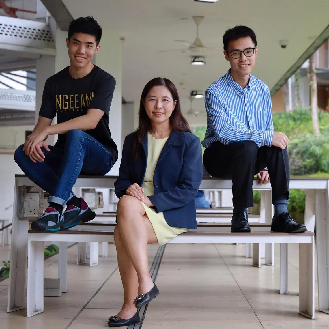 ST20230105_202377887219/jnpoly08/Jane Ng/Jason Quah

Polytechnic educator Anna Yap with her sons Oliver (left), who went the poly route, and Luther (right), who went the JC route.