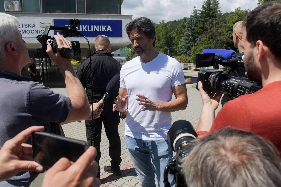 Slovak Defence Minister and Deputy Prime Minister Robert Kaliniak addressing the media outside the hospital where Slovak PM Robert Fico is being treated, on May 18.