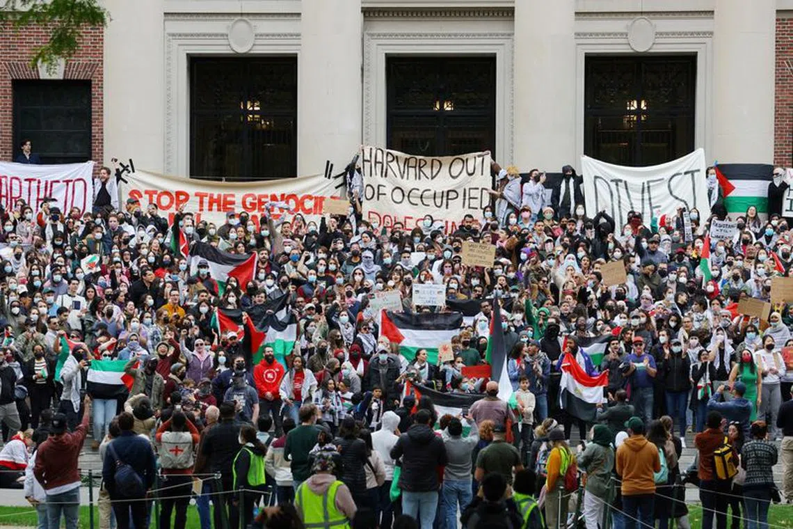 FILE PHOTO: Demonstrators take part in an \"Emergency Rally: Stand with Palestinians Under Siege in Gaza,\" amid the ongoing conflict between Israel and the Palestinian Islamist group Hamas, at Harvard University in Cambridge, Massachusetts, U.S., October 14, 2023.   REUTERS/Brian Snyder