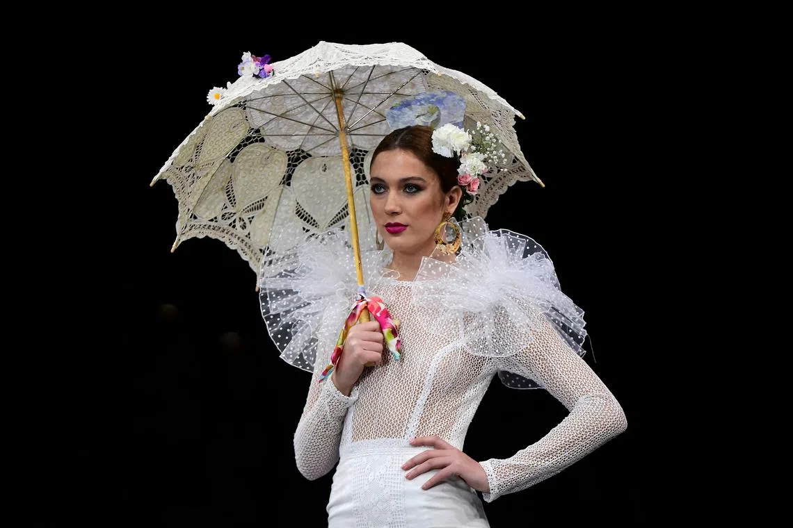A model presents a creation by Atelier Rima during the Simof 2023 (International Flamenco Fashion Show) in Sevilla on Jan 29, 2023.