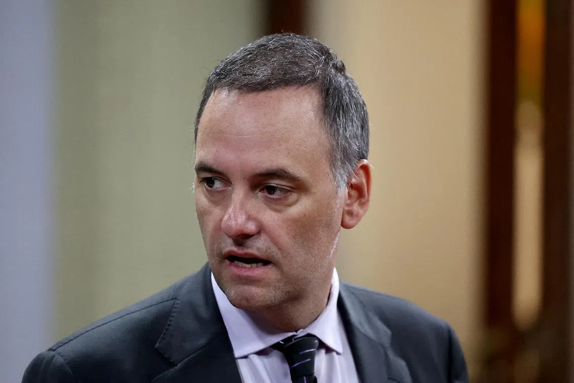 FILE PHOTO: Argentina's presidential spokesperson Manuel Adorni looks on, at the Casa Rosada Presidential Palace, in Buenos Aires, Argentina February 23, 2024. REUTERS/Agustin Marcarian/File Photo