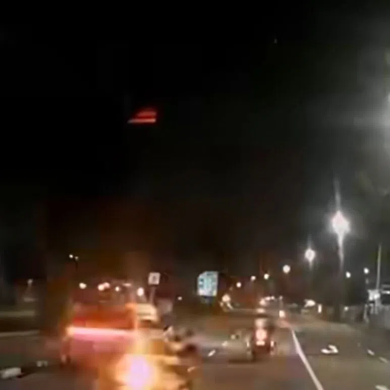 Dashcam footage shows Traffic Police officers on motorcycles allegedly riding without due care along Ubi Avenue 3.