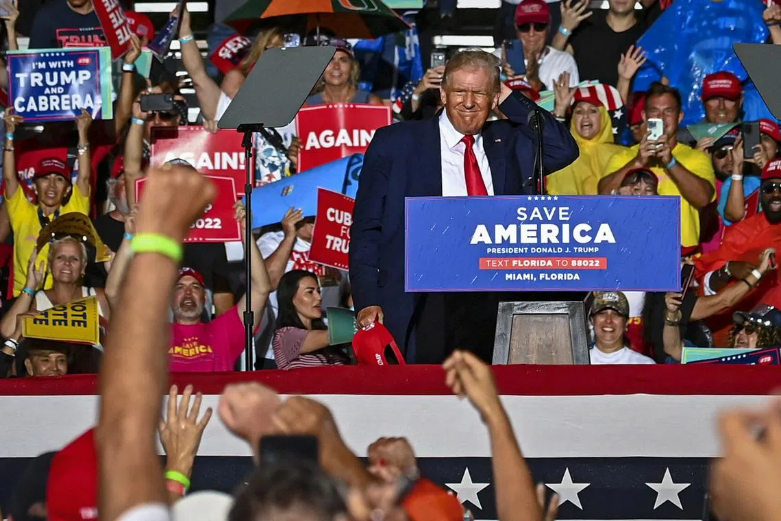 Mr Donald Trump's shadow looms large over this election in which he has endorsed scores of candidates.