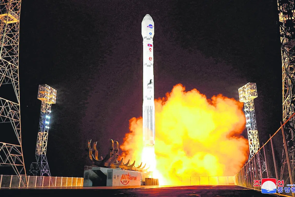 A rocket carrying a spy satellite Malligyong-1 is launched.