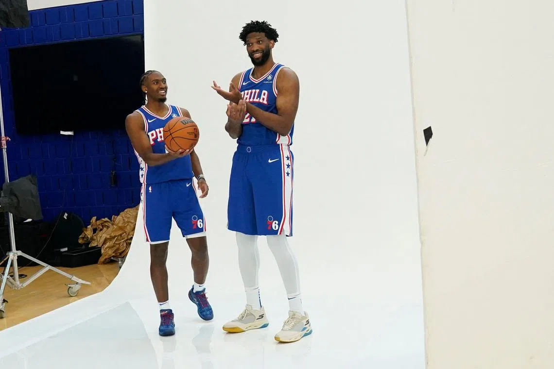 Philadelphia 76ers guard Tyrese Maxey and centre Joel Embiid pose for photos during the Sixers media day.