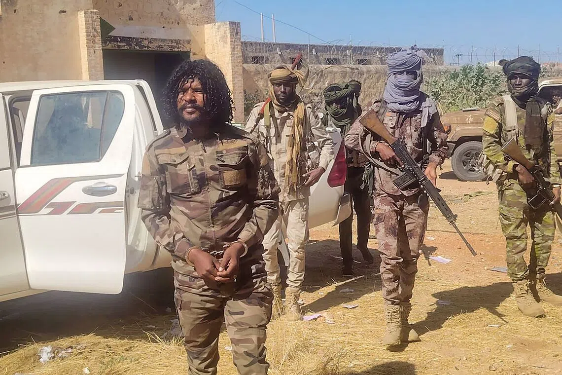 Sudanese Rapid Support Forces purportedly detaining a fighter in El-Fasher, in the war-torn country’s western Darfur region.