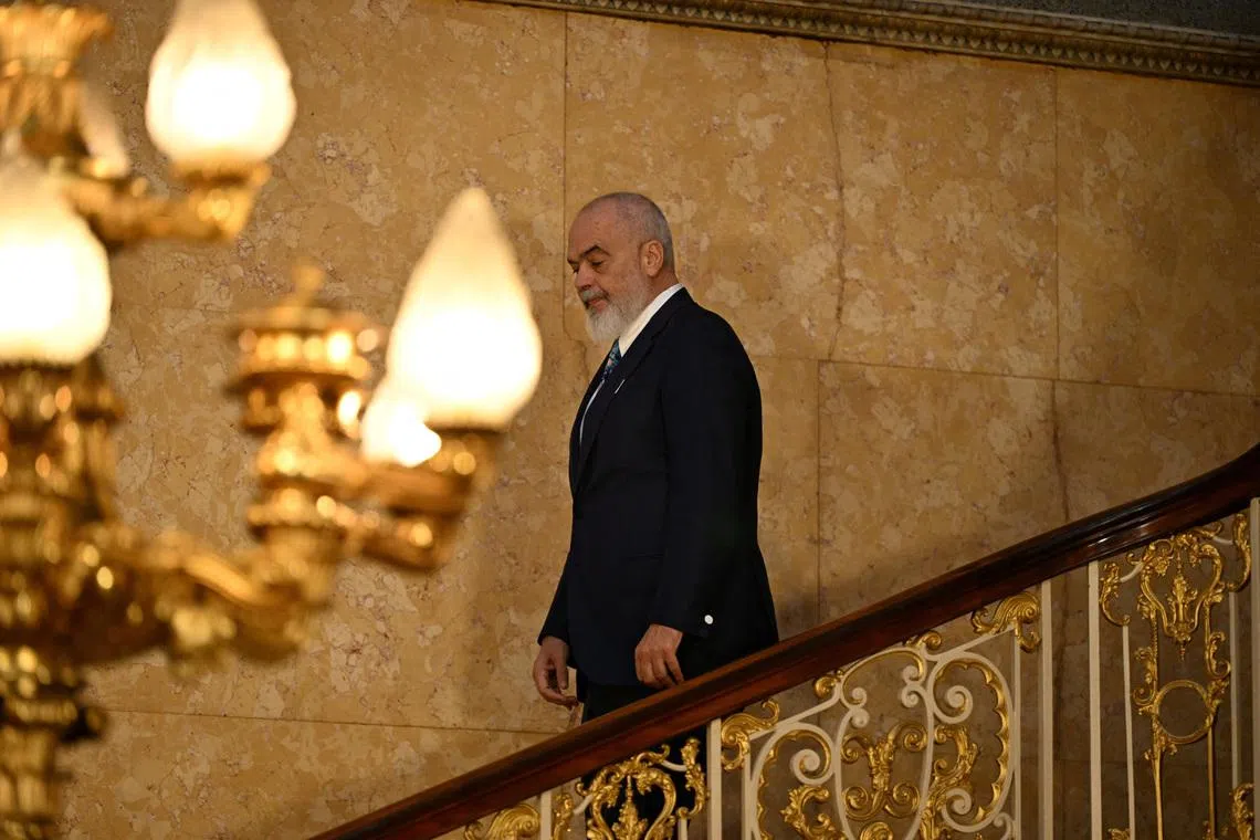 Albanian Prime Minister Edi Rama walks after posing for the family photo during the Western Balkans Summit in central London, Britain, October 22, 2025.  Chris J Ratcliffe/Pool via REUTERS
