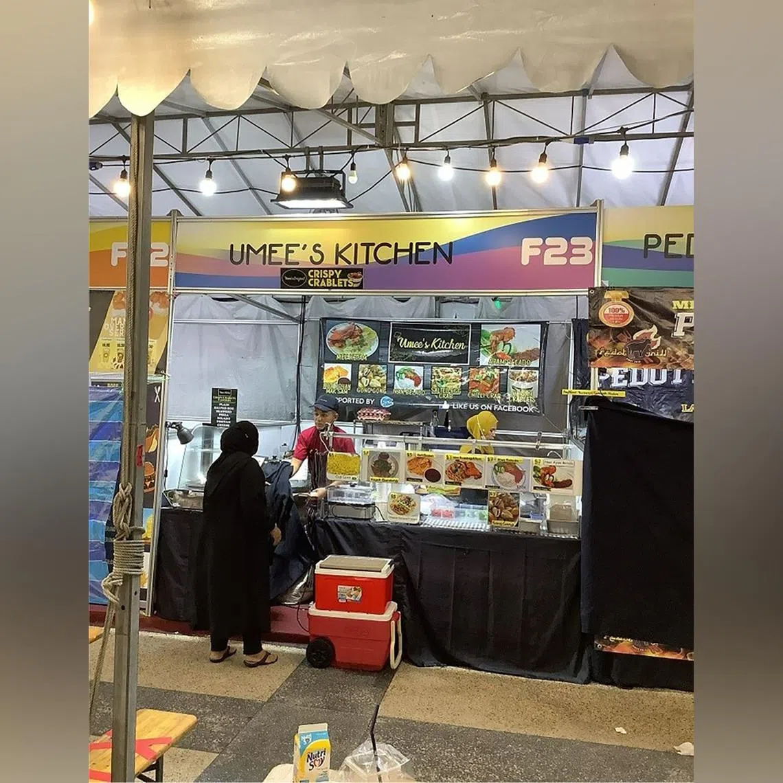 A food stall at the temporary fair at Wisma Geylang Serai was found operating without a valid licence.