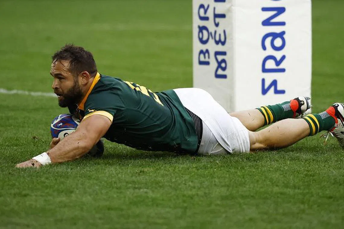 Rugby Union - Rugby World Cup 2023 - Pool B - South Africa v Romania - Matmut Atlantique, Bordeaux, France - September 17, 2023 South Africa's Cobus Reinach scores their third try REUTERS/Stephane Mahe/File Photo