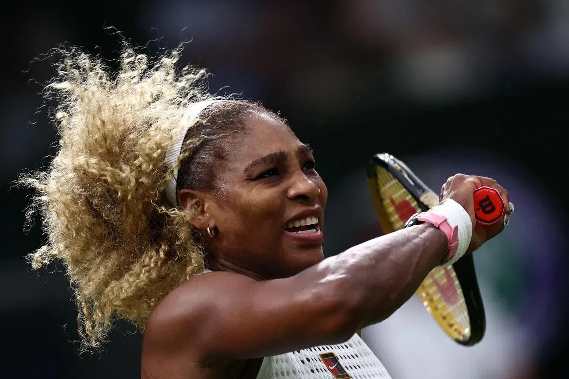 US player Serena Williams returns the ball to Australia's Maya Joint during their women's singles first round tennis match on the second day of the 2026 Wimbledon Championships at The All England Lawn Tennis and Croquet Club in Wimbledon, southwest London, on June 30, 2026. (Photo by HENRY NICHOLLS / AFP) / RESTRICTED TO EDITORIAL USE