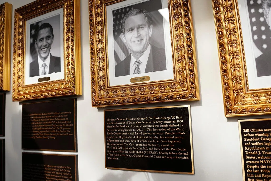 US President Donald Trump’s “Presidential Walk of Fame” at the White House features striking criticism of some of his predecessors, including Mr Barack Obama (left) and Mr George W. Bush.