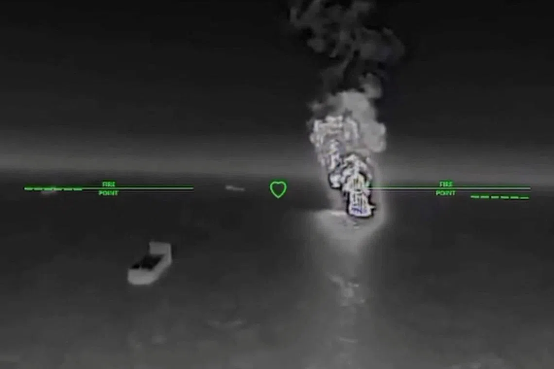 Smoke rises after what the Ukranian authorities say was during a strike as Ukrainian UAVs hit a Russian dark fleet tanker at a location given as Sea of Azov in this screengrab taken from a handout video released on July 7, 2026. Commander of Unmanned Aerial Systems Force/Handout via REUTERS
