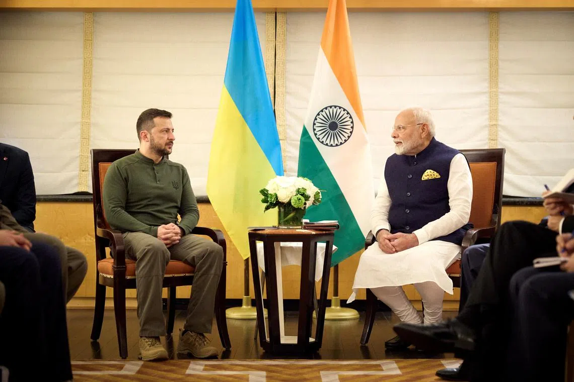 Ukraine's President Volodymyr Zelenskiy and Prime Minister of India Narendra Modi attend a meeting during the United Nations General Assembly summit in New York City, U.S., September 23, 2024. Ukrainian Presidential Press Service/Handout via REUTERS/File Photo