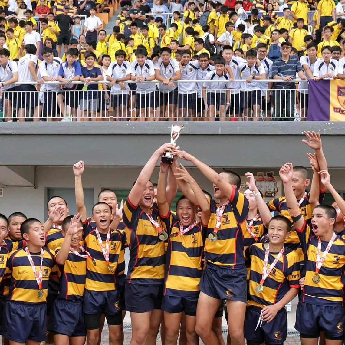 Anglo-Chinese School (Independent) lifting the trophy after defeating St Andrew?s Secondary School in the National School Games C Division rugby boys? final on Aug 26, 2024.
