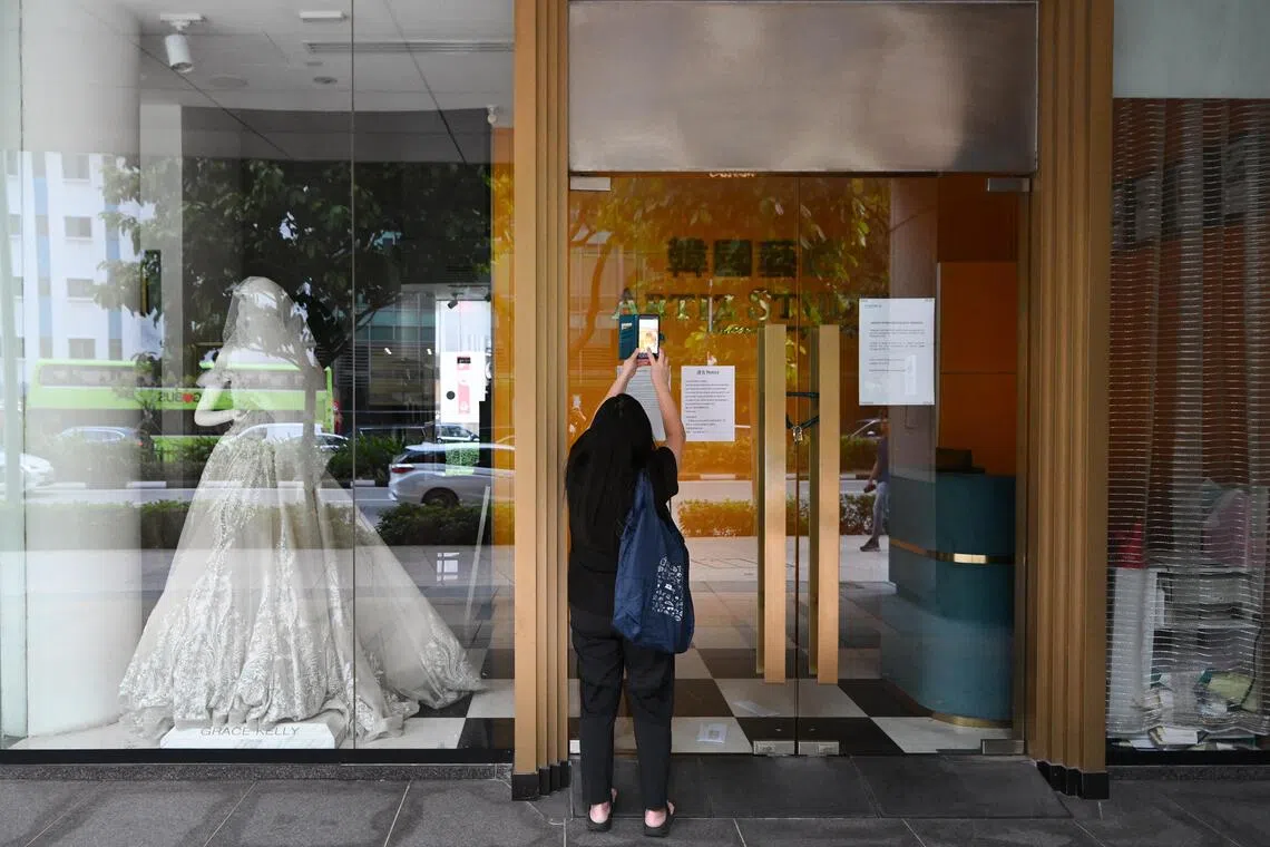 ST20260820-202616400647-Lim Yaohui-Daniel Lai-dlartiz20/

A woman taking photographs of Korea Artiz Studio at Carlton Hotel on Aug 20, 2026. 

The space occupied by Korea Artiz Studio, which abruptly ceased operations over unpaid salaries, has been repossessed by Carlton Hotel.

A notice, dated Aug 20 and pasted on the doors of the studio, reads: “Please be informed that Carlton Hotel (Singapore) has repossessed these premises with effect from Aug 20.”

The hotel confirmed to The Straits Times on Aug 20 that it has taken back the premises.

Korea Artiz Studio abruptly ceased operations on Aug 14 over unpaid salaries. The Consumers Association of Singapore (CASE) said on Aug 19 that it received 66 complaints from the bridal store’s customers between Aug 14 and 18.

More than $271,000 in pre-payment losses were reported by customers after they failed to get a response from the business on whether contracted services would be fulfilled or if they could get a refund, said CASE.

(ST PHOTO: LIM YAOHUI)