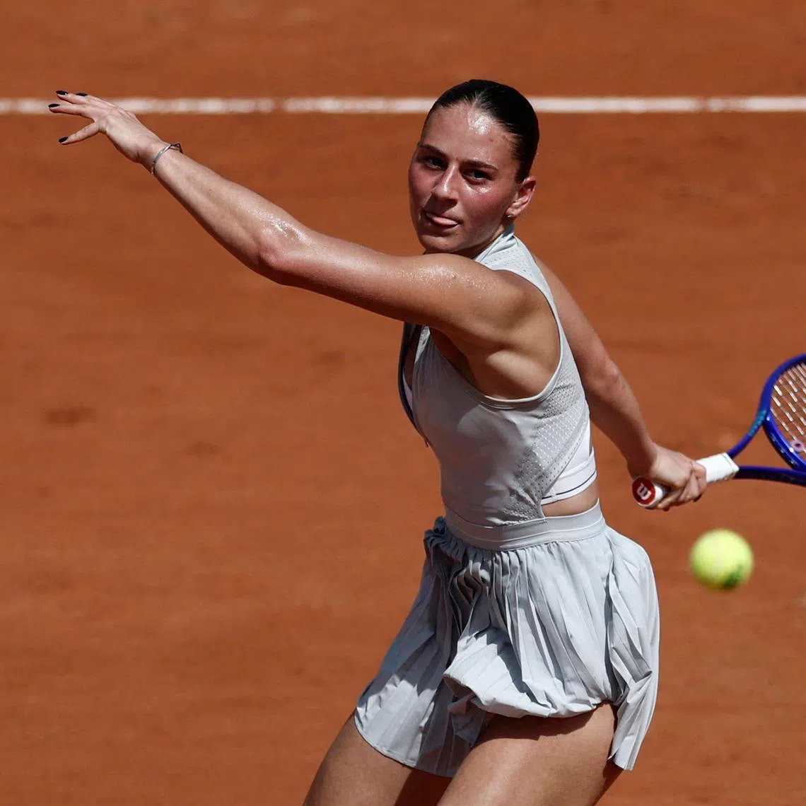 Ukraine's Marta Kostyuk in action during her first round match against Russia's Oksana Selekhmeteva.