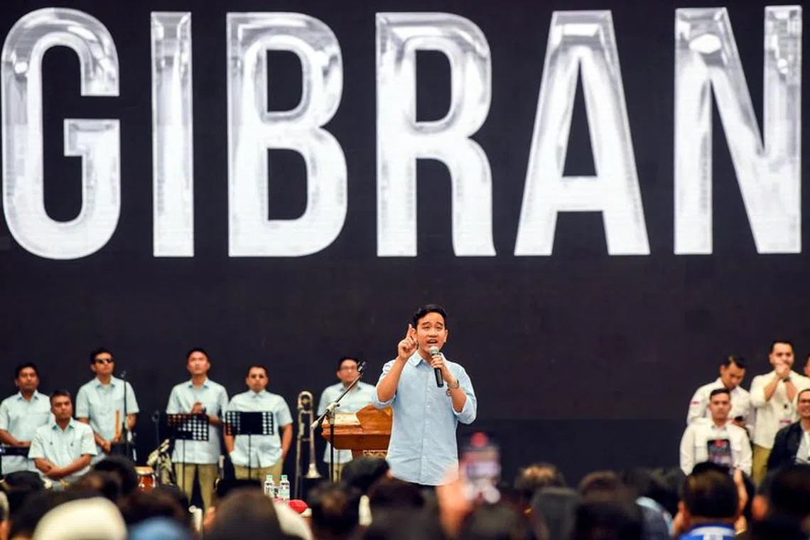 FILE PHOTO: Indonesian vice-presidential candidate Gibran Rakabuming Raka, who is the eldest son of Indonesian President Joko Widodo and Surakarta's Mayor, delivers his speech, before registering himself for next year's presidential election with Prabowo Subianto, Indonesia's defence minister and presidential candidate, in Jakarta, Indonesia, October 25, 2023, in this photo taken by Antara Foto. Antara Foto/Galih Pradipta/ via REUTERS/File photo