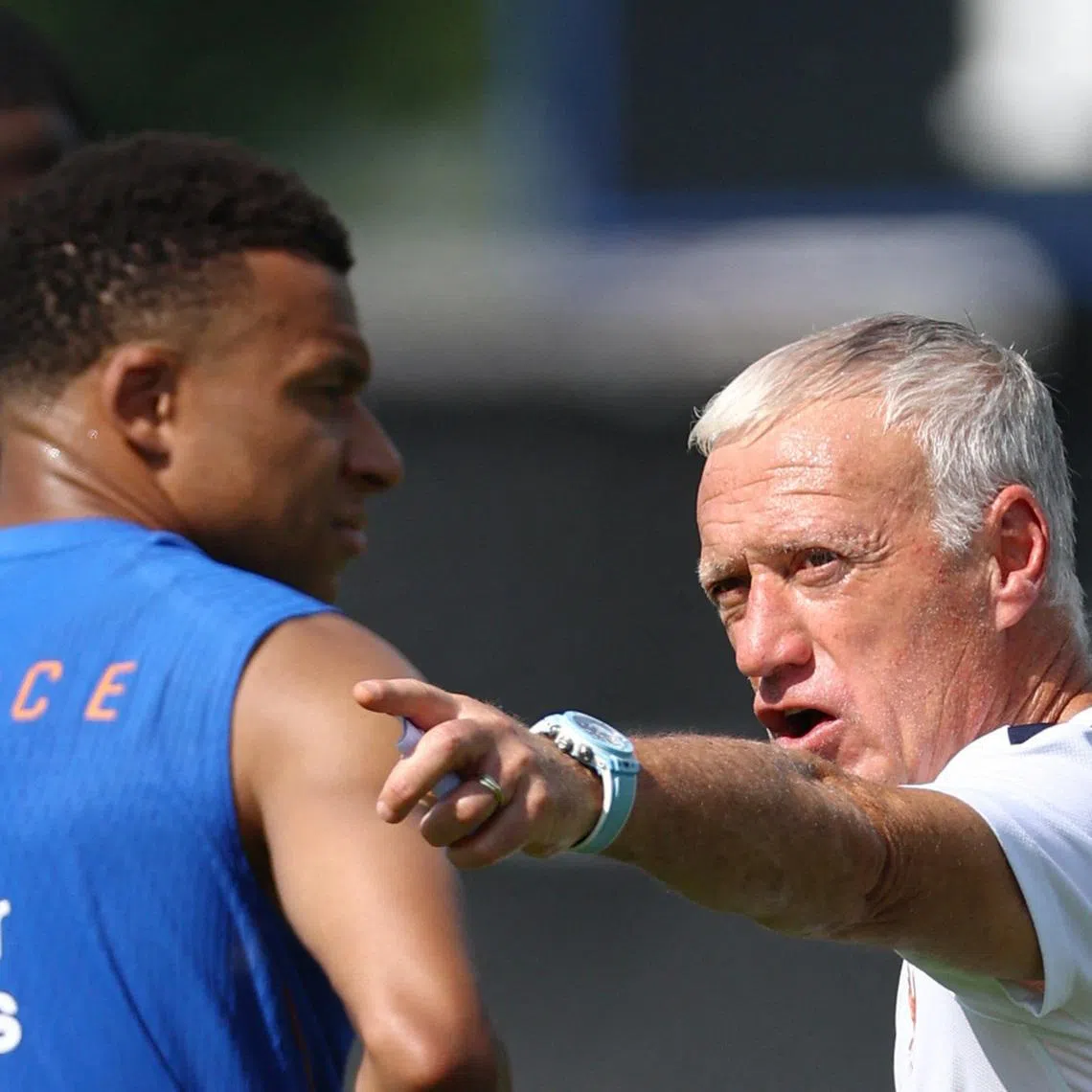 Soccer Football - FIFA World Cup 2026 - France Training - Bentley University, Waltham, Massachusetts, U.S. - June 12, 2026  France coach Didier Deschamps and Kylian Mbappe during training REUTERS/Peter Cziborra