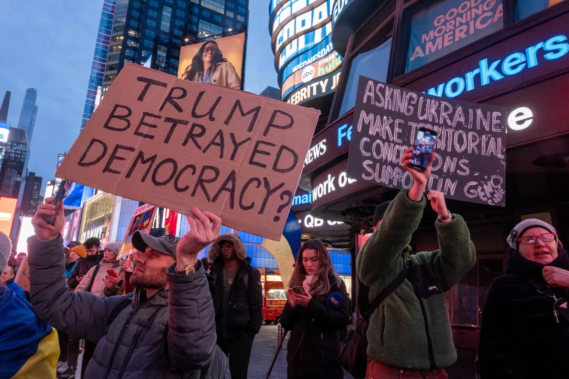 Supporters of Ukraine rally in Times Square to mark the three-year anniversary of the invasion by Russia, in New York City, on Feb 24. 