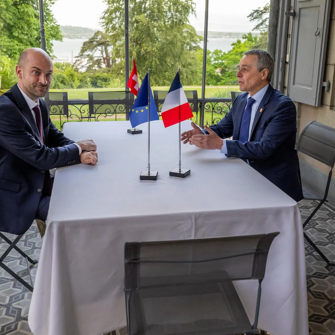 Switzerland's Foreign Minister Ignazio Cassis and France's Foreign Affairs Minister Jean-Noel Barrot attend a bilateral meeting between Switzerland and France ahead of the G7 Summit, in Geneva, Switzerland, May 8, 2026. MARTIAL TREZZINI/Pool via REUTERS