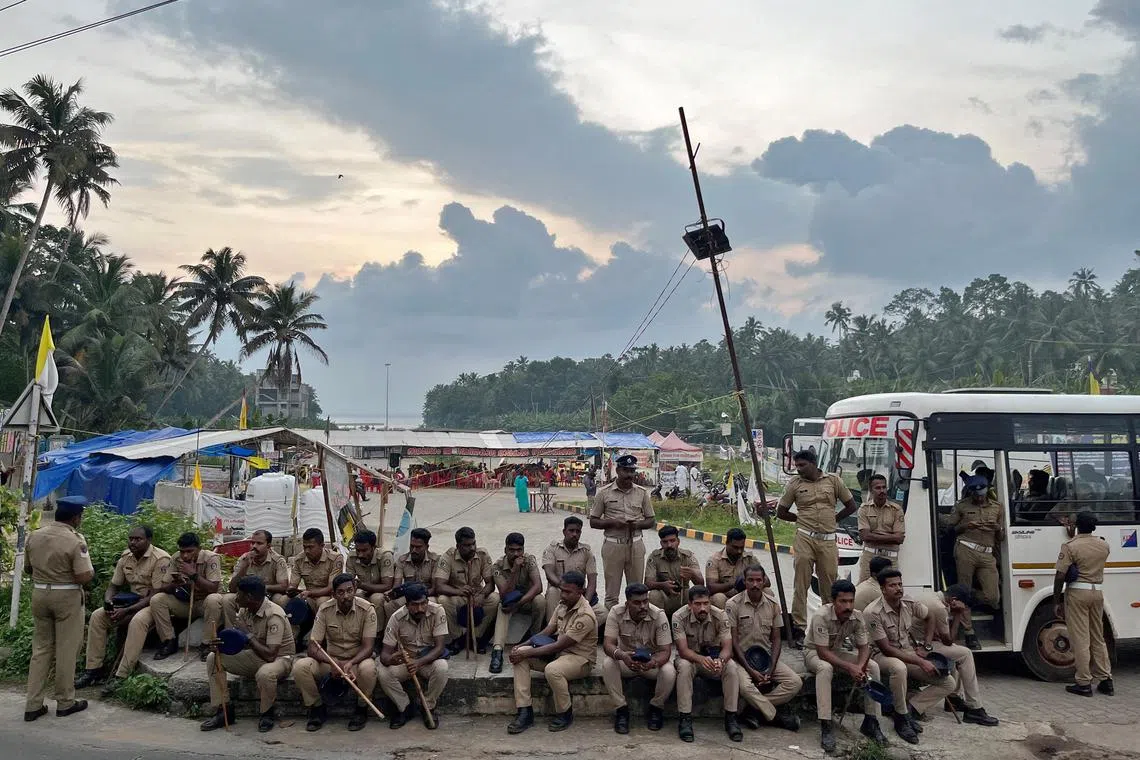 Police officers are deployed as fishermen protest near the entrance of the proposed Vizhinjam Port in the southern state of Kerala, India, Nov 9, 2022.