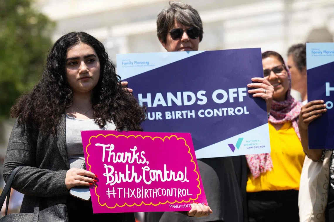 Supporters of the "Right to Contraception Act," which would codify the ability to obtain and voluntarily use birth control in federal law and allow family planning providers to provide contraceptive care, hold a press conference outside the US Capitol in Washington, DC, June 14, 2023. (Photo by SAUL LOEB / AFP)