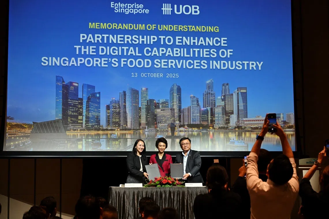 Senior Minister of State for Trade and Industry Low Yen Ling (centre) with Jeannie Lim (left), an assistant managing director at EnterpriseSG, and Head of UOB Singapore Paul Kan at the Food Services Forum on Oct 13.