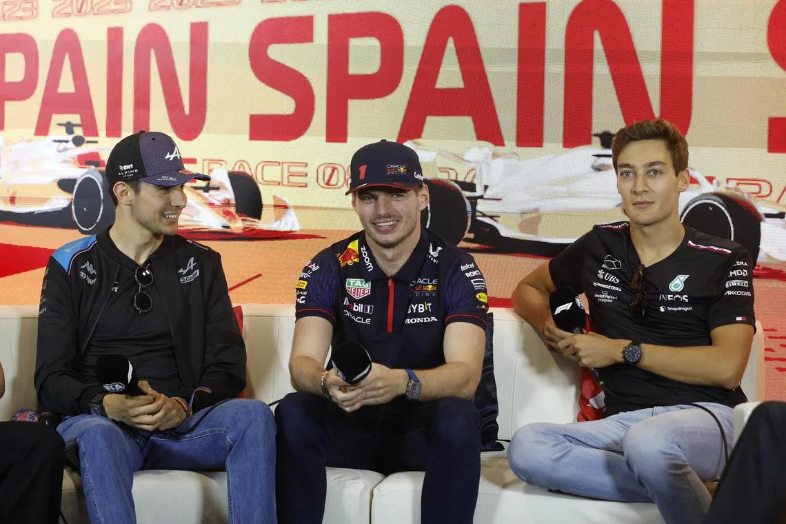 From left: Alpine's Esteban Ocon, Red Bull's Max Verstappen and Mercedes' George Russell during a press conference ahead of the Spanish Grand Prix.