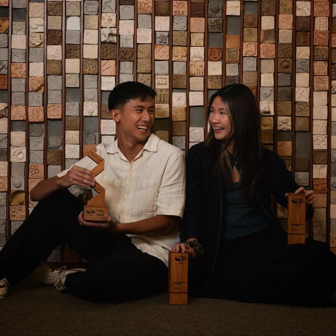 ST journalists Wong Yang (left) and Christie Chiu won the Editor-in-Chief Award and ST’s Young Journalist of the Year award at SPH Media’s annual English, Malay and Tamil Media Group award ceremony on May 5.