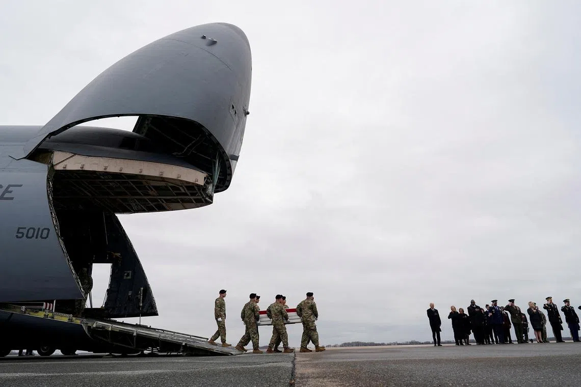 FILE PHOTO: U.S. President Joe Biden, first lady Jill Biden, Secretary of Defense Lloyd J. Austin III and Chairman of the Joint Chiefs of Staff and Air Force General Charles Q. Brown attend the dignified transfer of the remains of Army Reserve Sergeants William Rivers, Kennedy Sanders and Breonna Moffett, three U.S. service members who were killed in Jordan during a drone attack carried out by Iran-backed militants, at Dover Air Force Base in Dover, Delaware, U.S., February 2, 2024. REUTERS/Joshua Roberts/File Photo