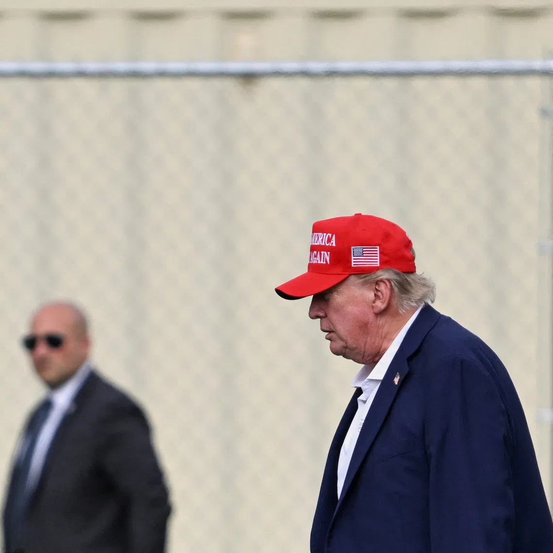 US President Donald Trump walking from Marine One to a vehicle at the Ellipse near the White House, in Washington, the US, on Aug 16.