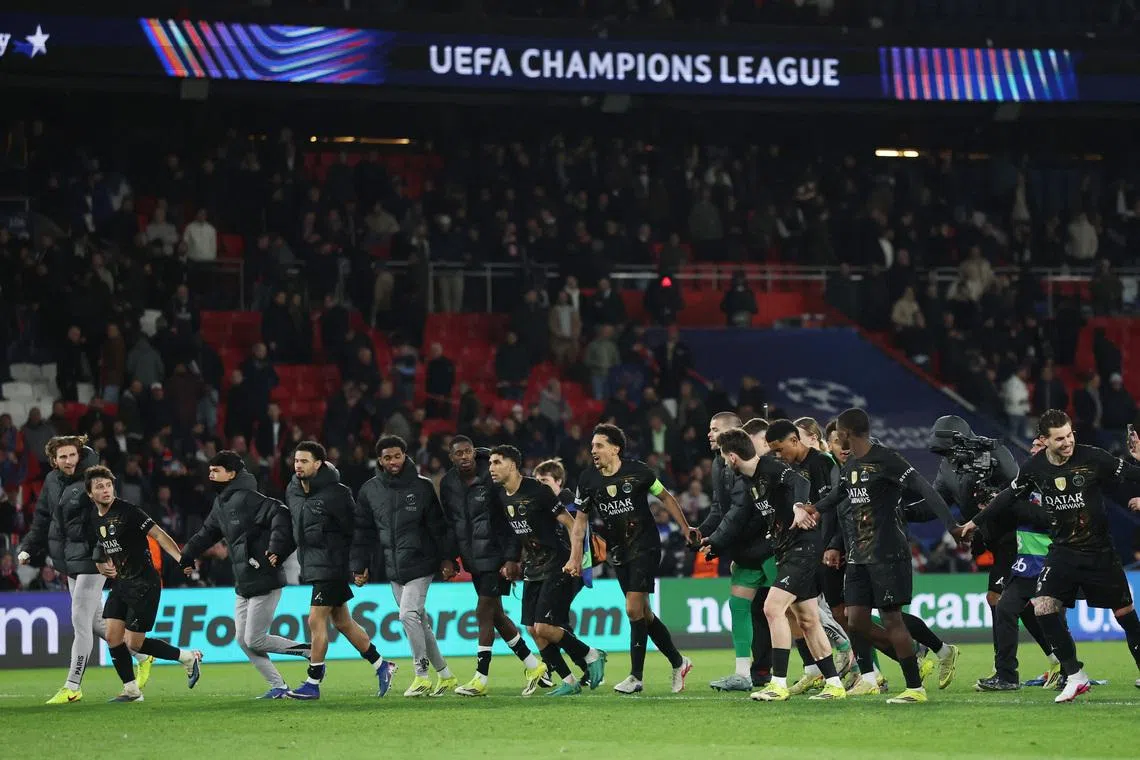 Soccer Football - UEFA Champions League - Round of 16 - First Leg - Paris St Germain v Chelsea - Parc des Princes, Paris, France - March 11, 2026 Paris St Germain players celebrate after the match REUTERS/Stephane Mahe