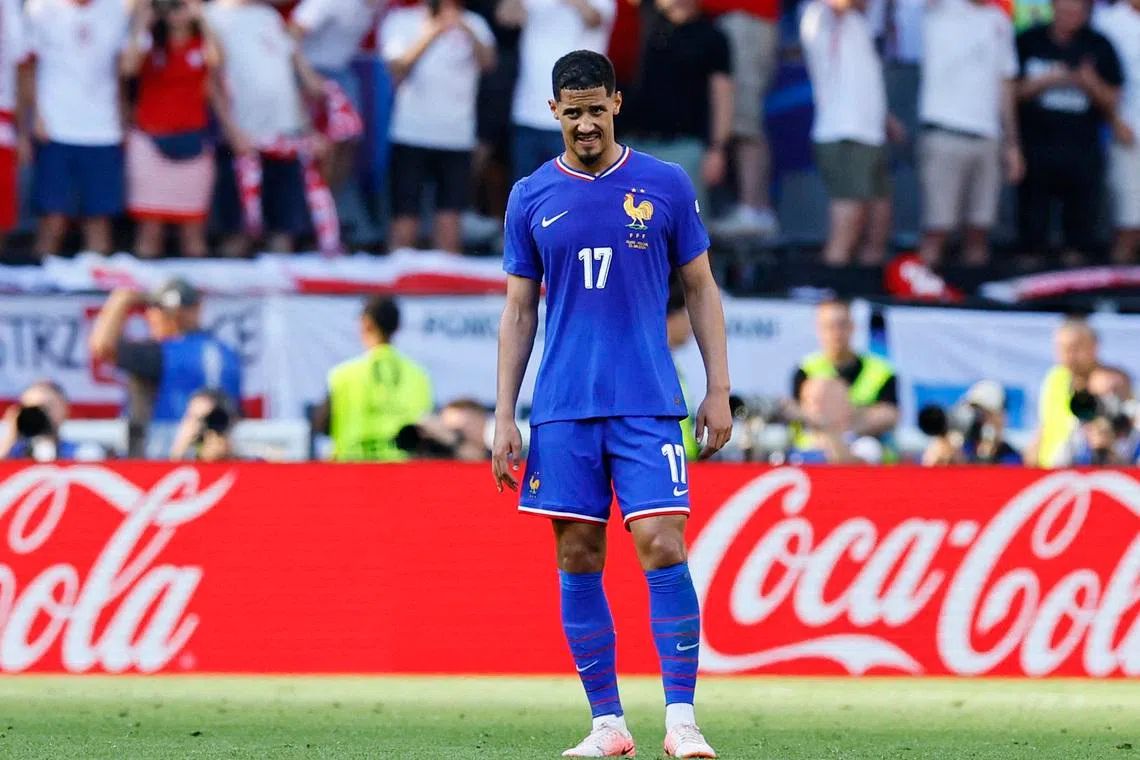 Soccer Football - Euro 2024 - Group D - France v Poland - Dortmund BVB Stadion, Dortmund, Germany - June 25, 2024 France's William Saliba reacts after Poland's Robert Lewandowski scores their first goal REUTERS/Leon Kuegeler