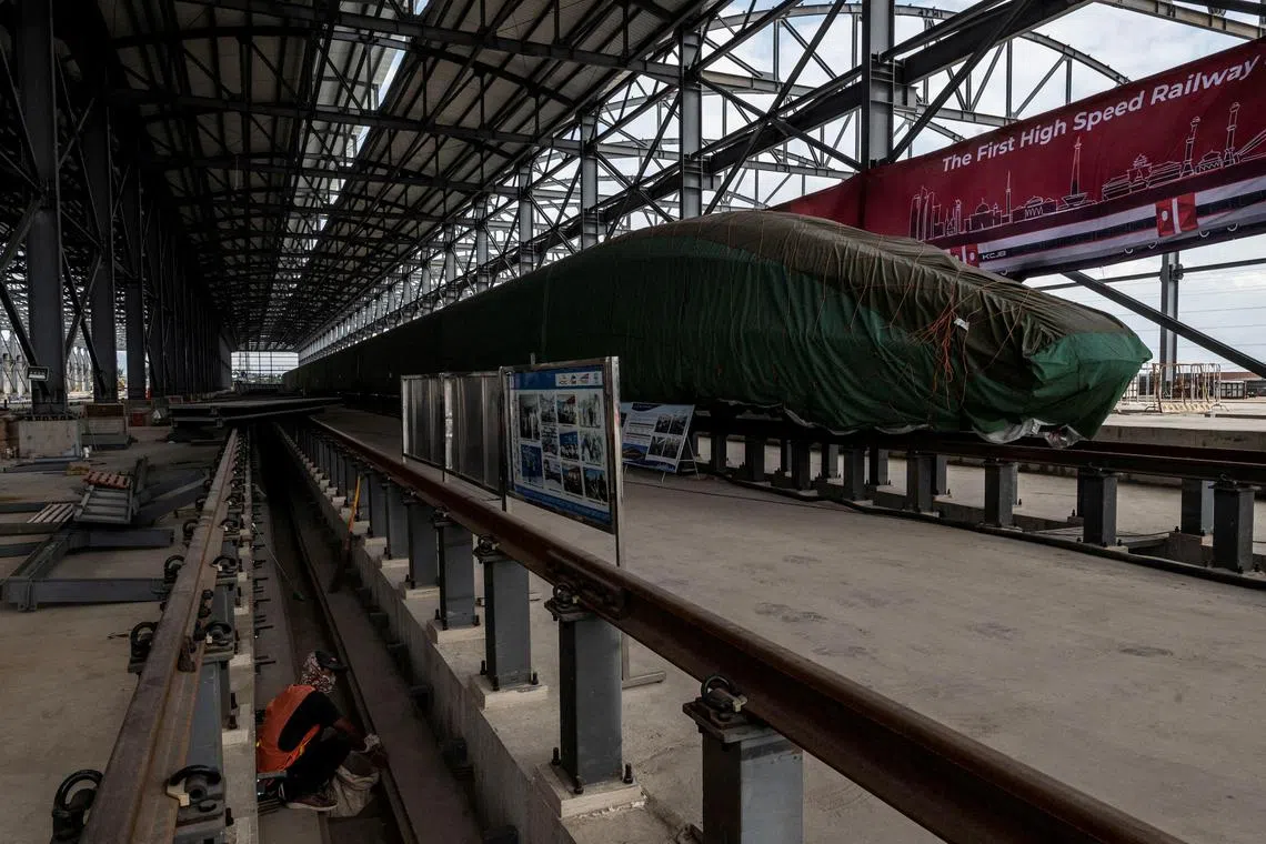 In this file photo, an electric multiple unit high-speed train for a rail link project, which is part of China's Belt and Road Initiative, is seen at the Tegalluar train depot construction site in Bandung, Indonesia.
