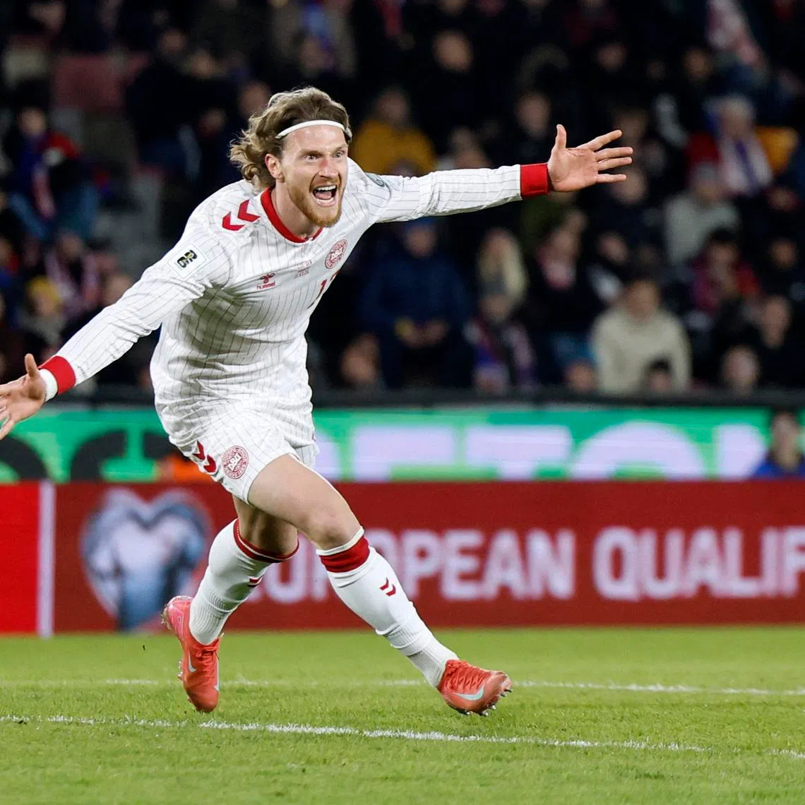 Soccer Football - FIFA World Cup - UEFA Qualifiers - Finals - Czech Republic v Denmark - epet ARENA, Prague, Czech Republic - March 31, 2026 Denmark's Kasper Hogh celebrates scoring their second goal REUTERS/David W Cerny