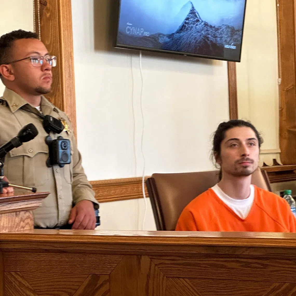 FILE PHOTO: Ryan Martinez, charged with attempted murder for the alleged shooting of Native American climate activist Jacob Johns at a protest against the installation of a statue of a Spanish conquistador, appears at a court hearing at Rio Arriba County Courthouse in Tierra Amarilla, New Mexico, U.S., October 13, 2023. REUTERS/Andrew Hay/File Photo