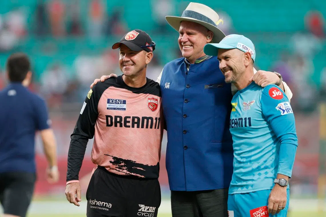 Cricket - Indian Premier League - IPL - Punjab Kings v Lucknow Super Giants - Himachal Pradesh Cricket Association Stadium, Dharamshala, India - May 4, 2025  Punjab Kings head coach Ricky Ponting, Lucknow Super Giants head coach Justin Langer and former cricketer Matthew Hayden before the match REUTERS/Mihir Singh