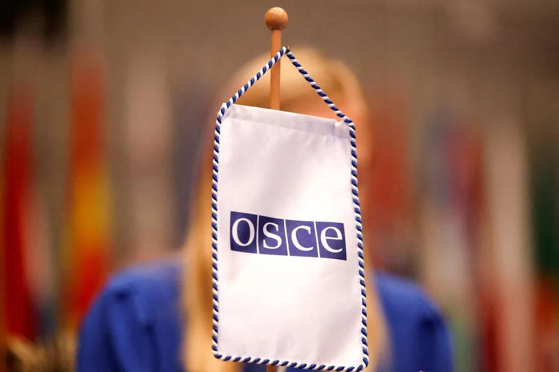 FILE PHOTO: An Organization for Security and Co-operation in Europe (OSCE) sign is pictured as Finnish Foreign Minister and OSCE Chairperson-in-Office Elina Valtonen presents a programme for OSCE 2025 Chairpersonship in Vienna, Austria, January 23, 2025. REUTERS/Lisa Leutner/File Photo