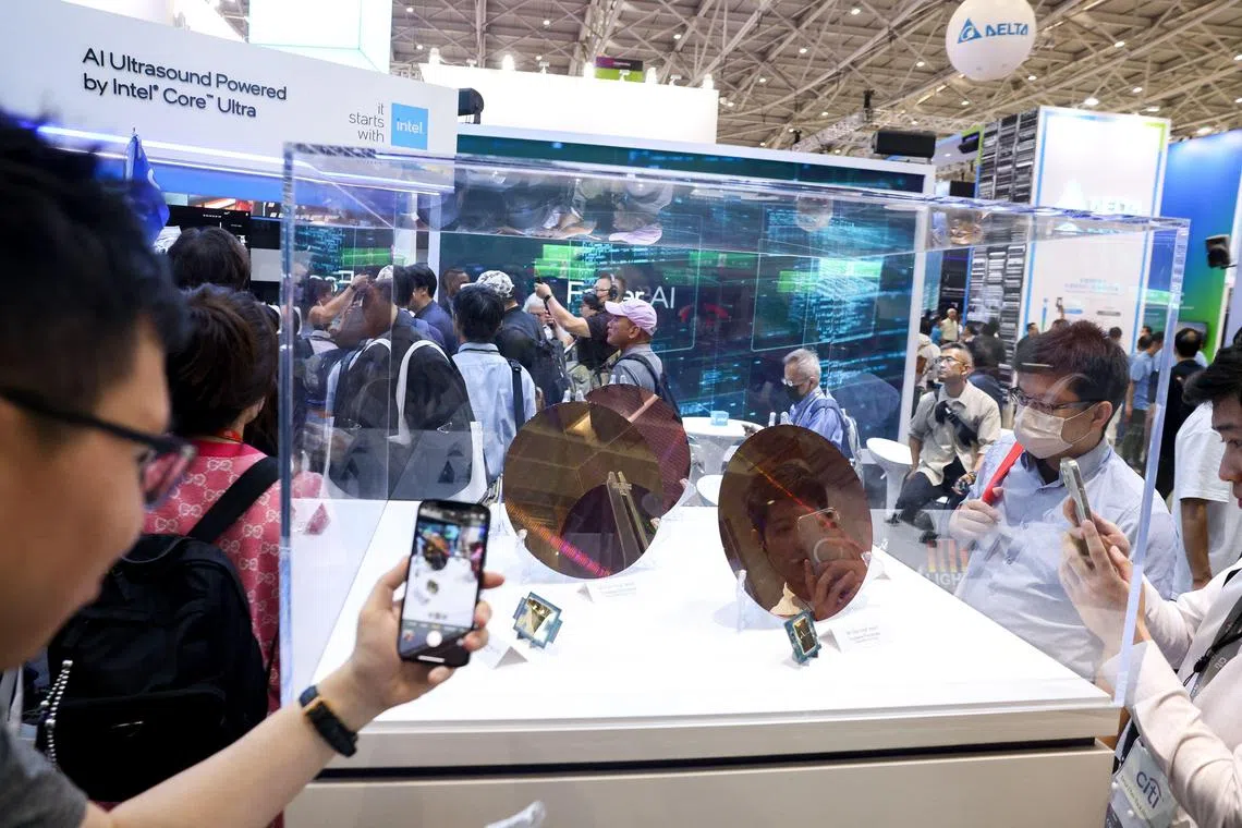 Wafer samples on display at a technology exhibition and trade show in Taipei in 2024.