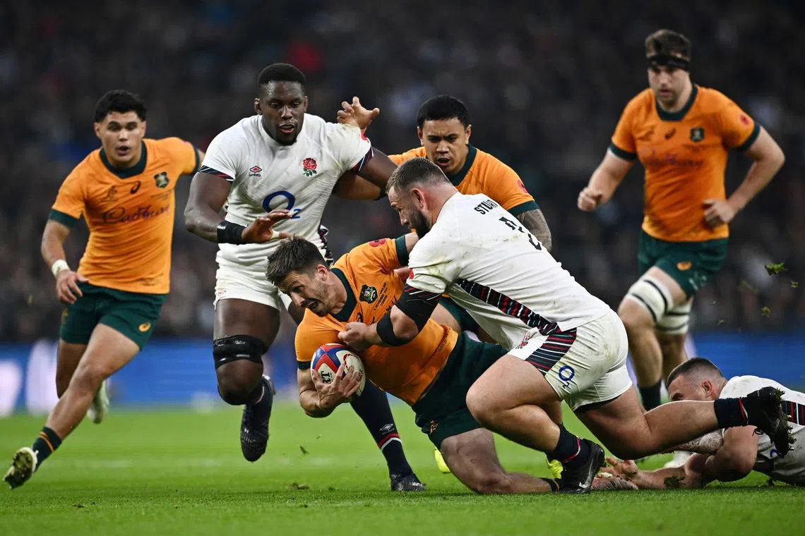 FILE PHOTO: Rugby Union - Autumn Internationals - England v Australia - Allianz Stadium Twickenham, London, Britain - November 9, 2024 Australia's Jake Gordon in action with England's Will Stuart REUTERS/Dylan Martinez/File Photo