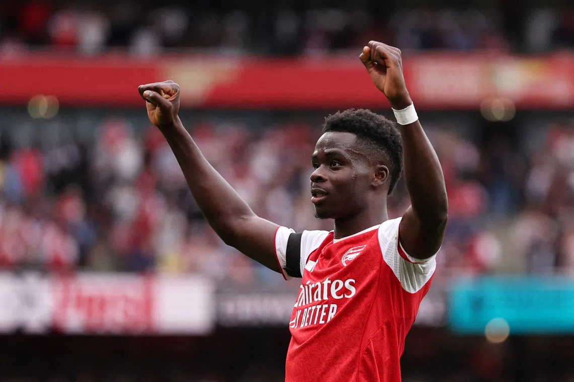 FILE PHOTO: Soccer Football - Premier League - Arsenal v Leeds United - Emirates Stadium, London, Britain - August 23, 2025 Arsenal's Bukayo Saka celebrates scoring their second goal REUTERS/David Klein/ File Photo