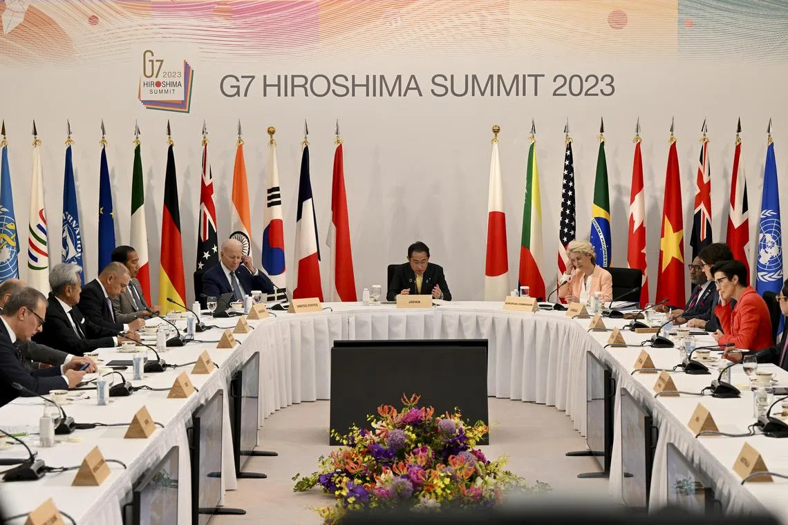 World leaders participate in a Partnership for Global Infrastructure and Investment meeting at the G-7 Summit in Hiroshima on Saturday.