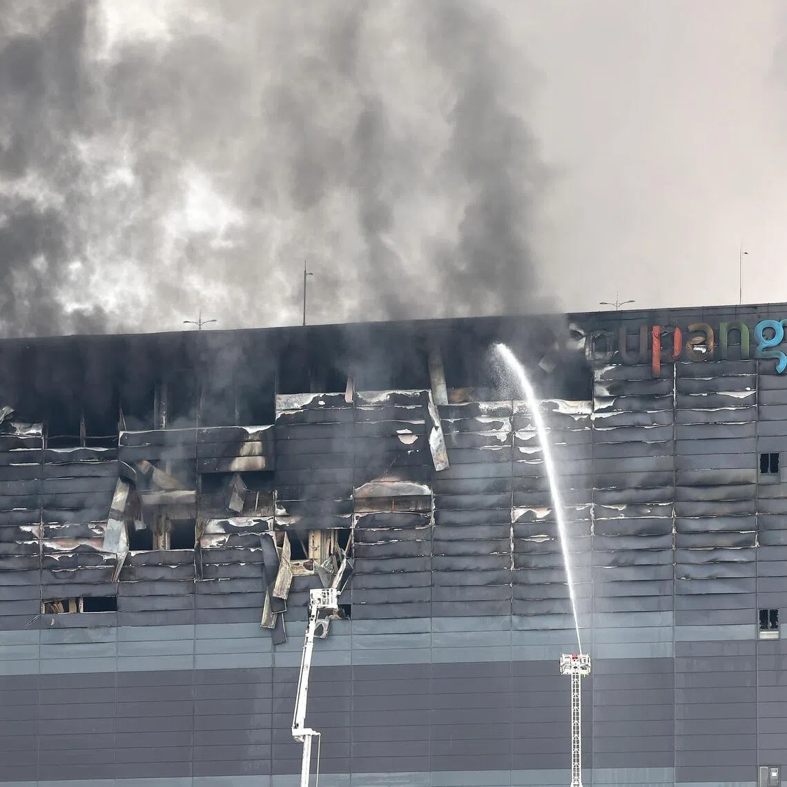 Smoke rising from a logistics centre operated by retail giant Coupang on July 19 after a fire broke out the day before in Incheon, South Korea.