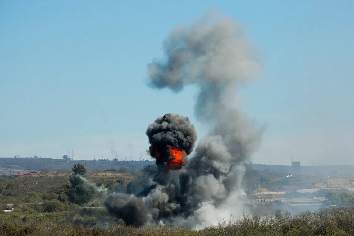 FILE PHOTO: A general view of a live-fire exercise as U.S. Vice President JD Vance and second lady Usha Vance (not pictured) attend the 250th anniversary celebration of the United States Marine Corps at Camp Pendleton, California, U.S., October 18, 2025. The event, titled \"From Sea to Shore: A Review of Amphibious Strength\", features a live amphibious assault demonstration and honored the Corps’ legacy of service and readiness.  REUTERS/Mike Blake/File Photo
