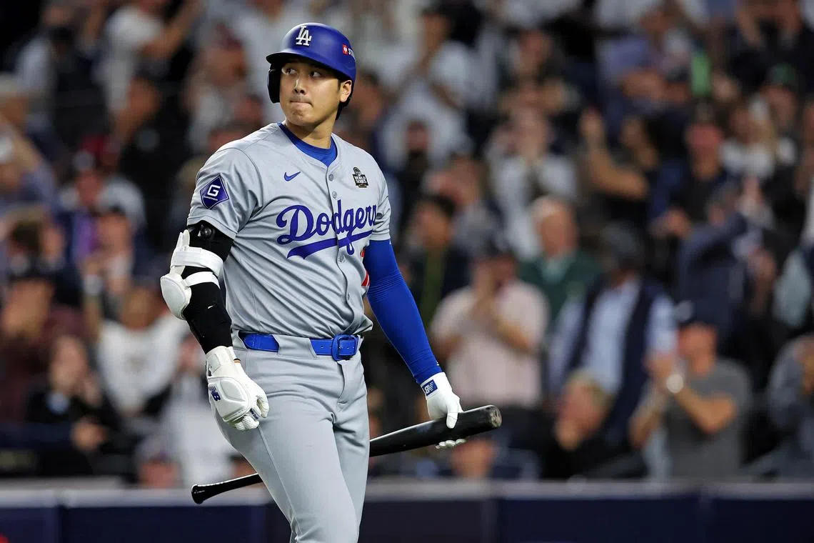 FILE PHOTO: Oct 30, 2024; New York, New York, USA; Los Angeles Dodgers two-way player Shohei Ohtani (17) reacts after striking out during the fifth inning against the New York Yankees in game four of the 2024 MLB World Series at Yankee Stadium. Mandatory Credit: Brad Penner-Imagn Images/File Photo