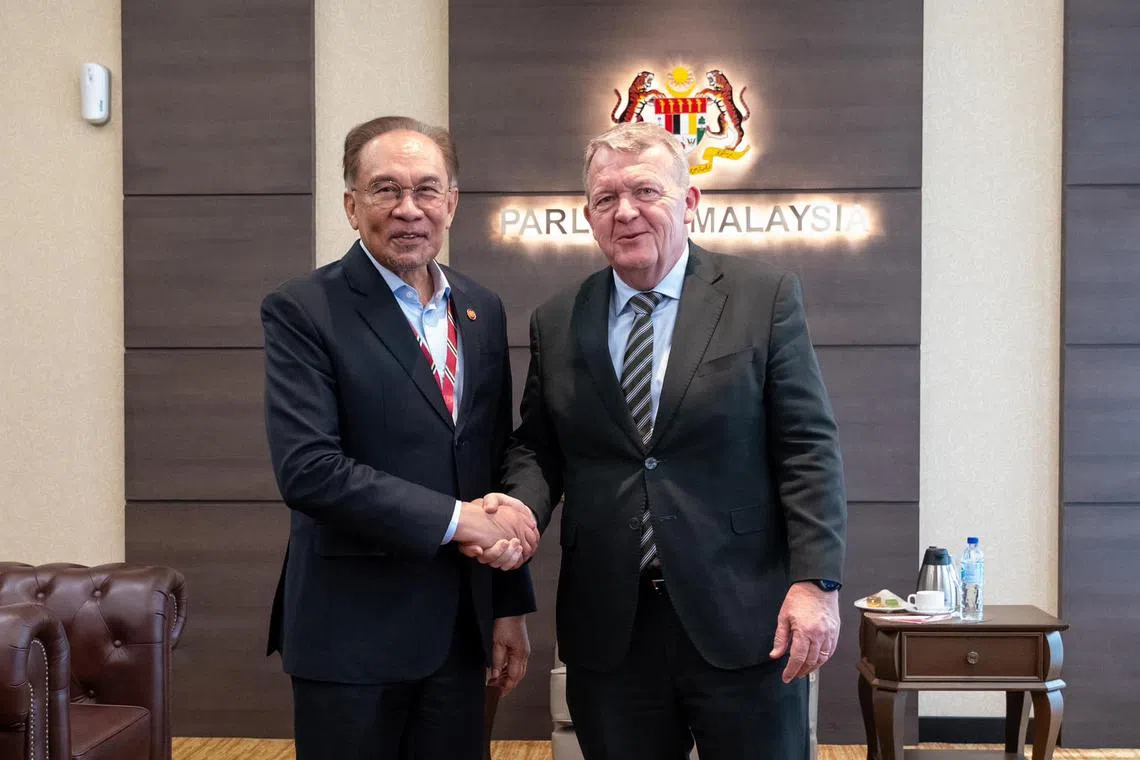 Mr Rasmussen (right) met with Malaysia’s Prime Minister Anwar Ibrahim (left) during his trip. 