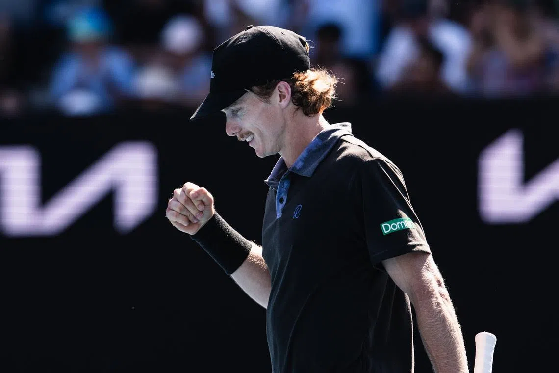 Jan 20, 2026; Melbourne, Victoria, Australia; Dane Sweeny of Australia in action against Gael Monfils of France in the first round of the men’s singles at the Australian Open at Kia Arena in Melbourne Park. Mandatory Credit: Mike Frey-Imagn Images