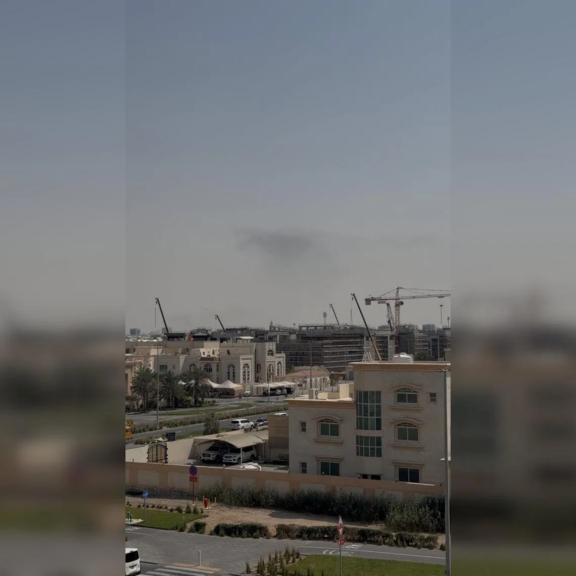 A still image from video shows smoke rising after strikes in Abu Dhabi on Feb 28.
