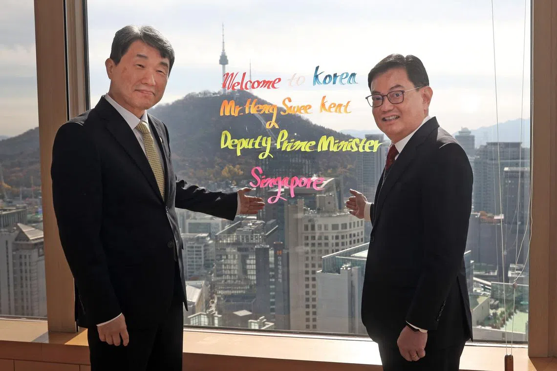 DPM Heng Swee Keat (right) with South Korea’s DPM and minister for education Dr. Lee Ju-Ho in Seoul, South Korea on Nov 19.